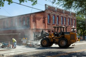 image of tractor on an urban construction site