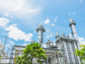 image of a powerplant against a blue sky